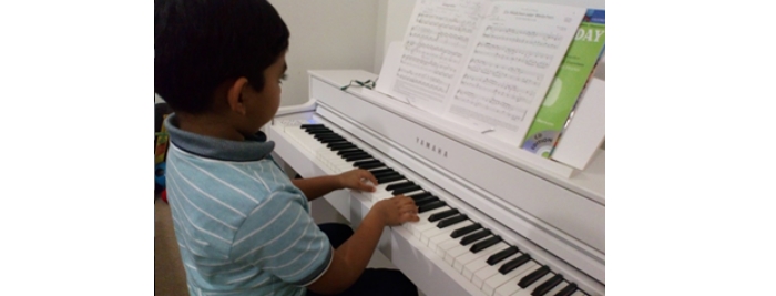 Haseeb playing the piano