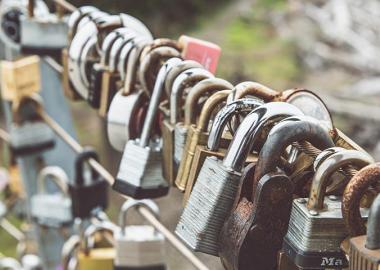 stock photo of locks on a bridge