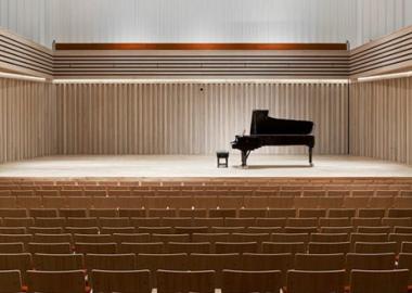 stock photo of grand piano on stage