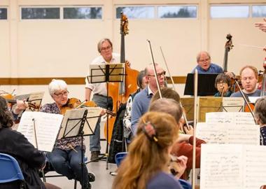 Abbots Langley Orchestra rehearse in a village hall